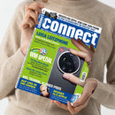 Person in beigefarbenem Strickpullover hält die Zeitschrift „connect“ mit blauem Titelkopf und Unterzeile „Die Test-Instanz für Smartphones“. Auf dem Cover: Abbildung eines Smartphones mit der Aufschrift „LEICA LEITZPHONE“, Themenfelder in Gelb, Grün und Blau mit Texten zu „WM-Spezial“, „Viel Technik, kleiner Preis“, „Apps für echte Fans“ und „Besser als Apple“, dazu ein Porträt eines Kopfhörer-tragenden Mannes unten links.