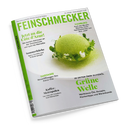 Titelblatt des Magazins „Feinschmecker“ mit grün-weißer Gestaltung. Zentral ein rundes, moosgrün bestäubtes Dessert auf weißem Teller, umgeben von grünen Kräutern und weißen Blüten. Textausschnitte: „Jetzt an die Côte d’Azur!“, „Sommerküche: Spicy Ceviche und Kräuterspargel“, „Grüne Welle – Weltklasse-Öle, Rezepte, Küchentipps und Warenkunde“, sowie regionale Themen zu Hamburg, Gardasee und Kaffee-Metropolen.