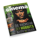 Titelblatt der Zeitschrift „cinema“ mit einem jungen, männlichen Darsteller mit lockigem braunem Haar, der einen goldenen Ring in den Händen hält, vor grünlich-dunklem Hintergrund. Hauptüberschrift: „DIE RÜCKKEHR DER HOBBITS“. Weitere Texte: „Alles zum Mittelerde-Sequel ‚Der Herr der Ringe: Shadow of the Past‘ PLUS: exklusive Interviews“, sowie kleinere Rubriken zu „House of the Dragon“, „Evil Dead Burn“ und „Die Odyssee“.