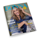 Schräg dargestelltes DONNA-Zeitschriftencover mit einer lächelnden weiblichen Person mit langen braunen Haaren und blauem Jeanshemd vor grauem Hintergrund; eine Hand liegt am Kopf. Sichtbare Texte: „Meine Zeit ist jetzt“, „Lesen, lachen, abtauchen“, „Neue Mode und die steht mir!“, „Zurück zur Jugendliebe?“, „Andalusien – dem Orient ganz nah“ und „MAL EHRLICH – Was ich nie wieder machen lassen würde …“.