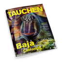 Titelblatt des Magazins „TAUCHEN“ in gelber Schrift auf dunkelblauem Hintergrund mit großem Nahfoto eines Fisches mit markanten Augen und Bartfäden zwischen Wasserpflanzen. Weitere sichtbare Texte: „Baja Mexikos artenreicher Westen California“, „Inselcheck! Tauchsafari auf Komodo, Nosy Be vor Madagaskar, Kapverden, Boa Vista“, „Equipment: Divesystem im Porträt“, „Test: Reglersets von Mares, Taschen von Camaro“.