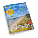 Titelbild des „ADAC Reisemagazin“ mit blauem Himmel, Strandlandschaft und dänischer Flagge auf einer Düne neben einem kleinen schwarzen Haus. Zwei Personen gehen am Ufer entlang. Sichtbare Überschriften: „Sommerglück in Dänemark“, „Kärnten neu erleben“, „Traumreise: Kanada“, „Auf nach Paris!“, gelber Kreis mit „Coolcation – Urlaub ohne Hitze“ und rotes Feld mit „1500 € Ferienhaus-Gutschein gewinnen“.