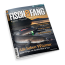 Schräg dargestelltes Angelmagazin mit dunklem, glänzendem Cover vor schwarzem Hintergrund; darauf ein silbrig-grauer Fisch mit Haken sowie rotem und grünem Köder im Maul. Lesbare Texte: „FISCH&FANG“, „Das Erlebnis-Magazin für Angler“, „Fishing World + Filme!“, „Alle lieben Wirrner“, „Besser Fangen mit Dendro, Misti & Taui“ und „fischundfang.de“.