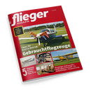 Schräg fotografierte Ausgabe des roten Magazins „flieger MAGAZIN“ auf schwarzem Hintergrund. Das Titelbild zeigt ein kleines einmotoriges Flugzeug mit „FOR SALE“-Bannern auf einem Flugplatz; Texte: „WAS EIN FLUGZEUG WIRKLICH KOSTET“, „Tipps für Kauf & Betrieb Gebrauchtflugzeuge“, „5 Flugzeug-Porträts: Cessna, Piper & Co.“ sowie „Einsteiger-Gebrauchte • Haltergemeinschaft • UL-Geheimtipps • Finanzierung“.