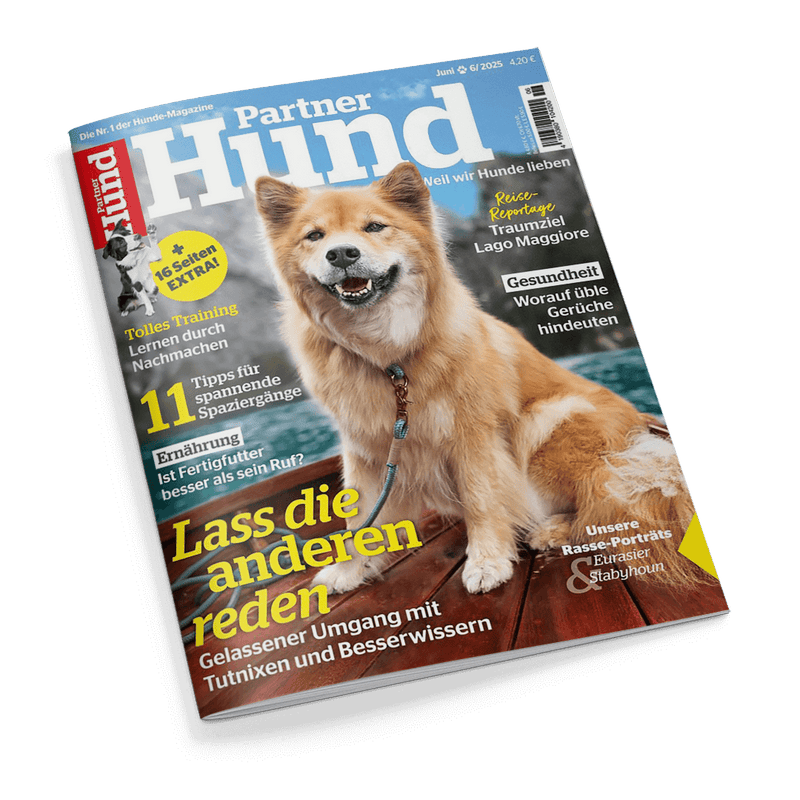 Cover der Zeitschrift Partner Hund mit einem lächelnden hellbraunen Hund und der Schlagzeile Lass die anderen reden.