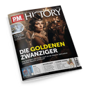 Schräg liegendes PM-HISTORY-Magazin mit schwarzem Cover auf schwarzem Hintergrund. Darauf eine weibliche Person mit dunklem Haar, Stirnband, Perlenketten und langem Zigarettenhalter in einer historischen Tanzszene; sichtbare Texte: „Europas größtes Monatsmagazin für Geschichte“, „DIE GOLDENEN ZWANZIGER“, „Was fasziniert uns heute noch so an diesem Jahrzehnt zwischen Rausch und Ruin?“, „9/11“, „BUCHKUNST“ und „TOMOE GOZEN“.