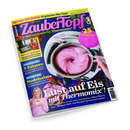 Schräg auf schwarzem Hintergrund liegendes Magazin „ZauberTopf“ mit blauem Cover, pinker und gelber Schrift sowie Thermomix®-Logo. Abgebildet sind ein Thermomix mit rosa Eiscreme und Löffel, eine Hand, Erdbeeren, Rezeptbilder und eine blonde Frau; sichtbare Texte: „Lieblingsrezepte für Thermomix“, „Lust auf Eis mit Thermomix!“ und „10 neue Kracher-Sorten ohne Eismaschine“.